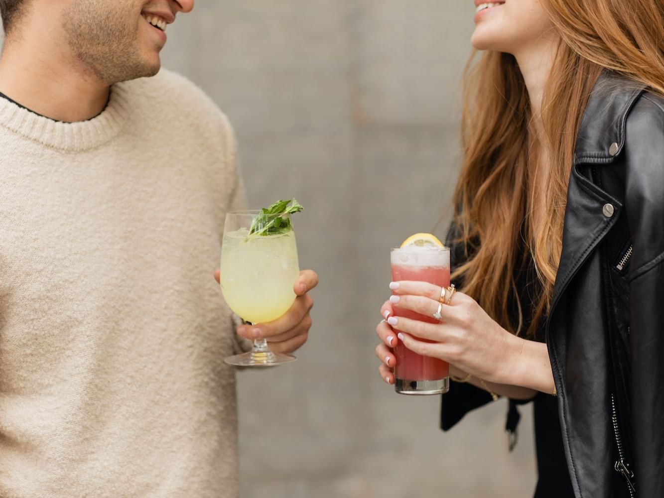 Close-up of a couple enjoying cocktails at Luxe Sunset Boulevard Hotel
