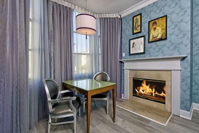Work desk by the fireplace at Executive City View, Hotel Fiona