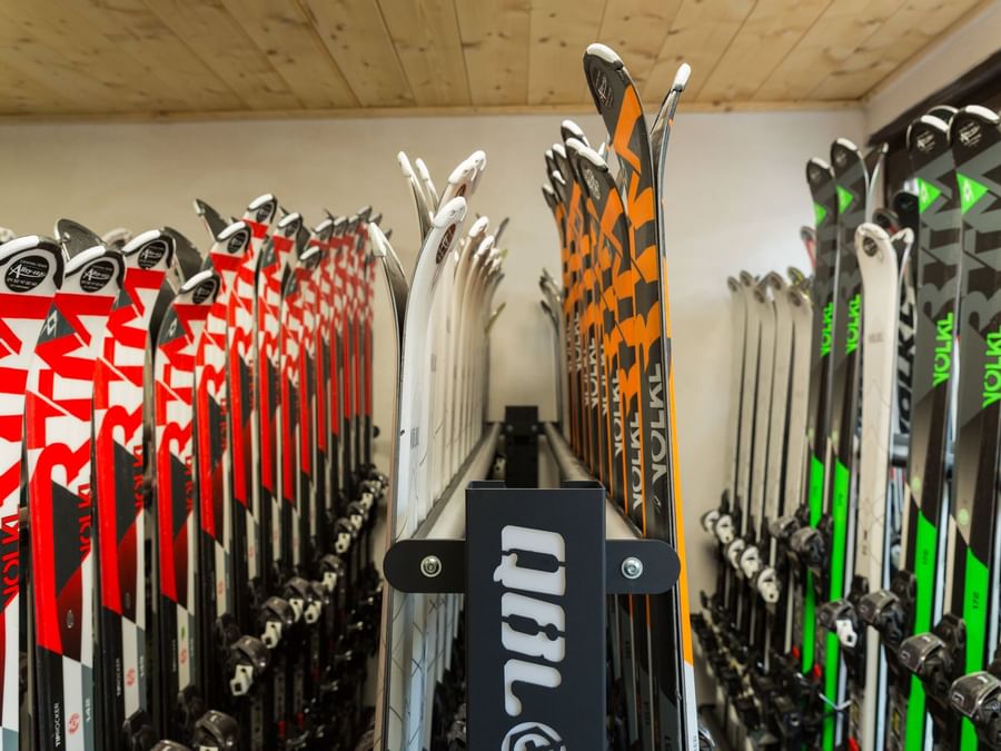 Rows of wooden skis in sport equipment store in La Chemenaz