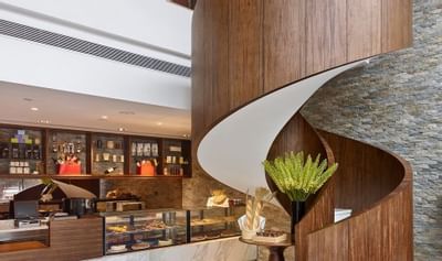 Display of baked goods in Deli shop lounge at White Swan hotel