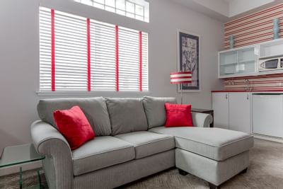 The living area in Queen Premiere La Rouge at Retro Suites