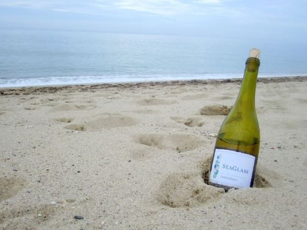 A bottle of champagne in the beach at Inn at Avila Beach 