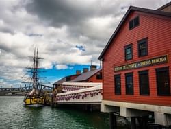 a ship next to a building