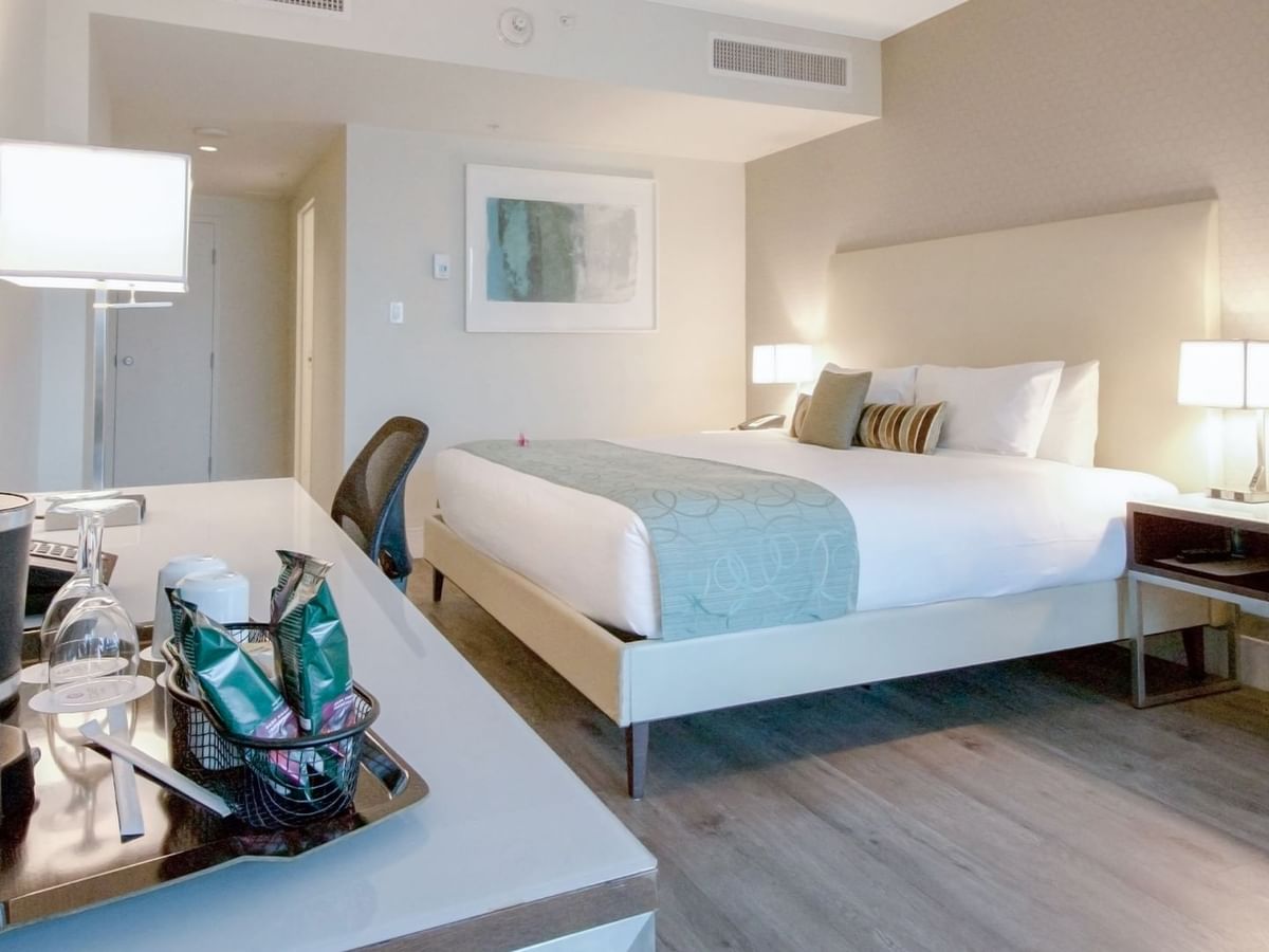 king bed with tea and coffee