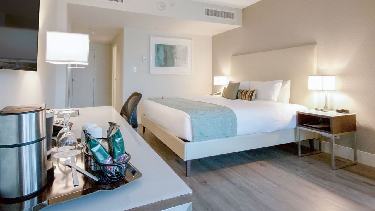 king bed with tea and coffee