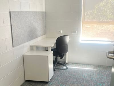 Office room with desk and chair in La Trobe University - Orde House.