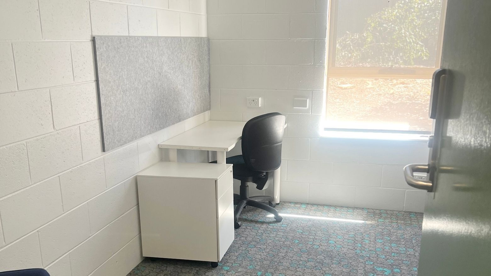 Office room with desk and chair in La Trobe University - Orde House.