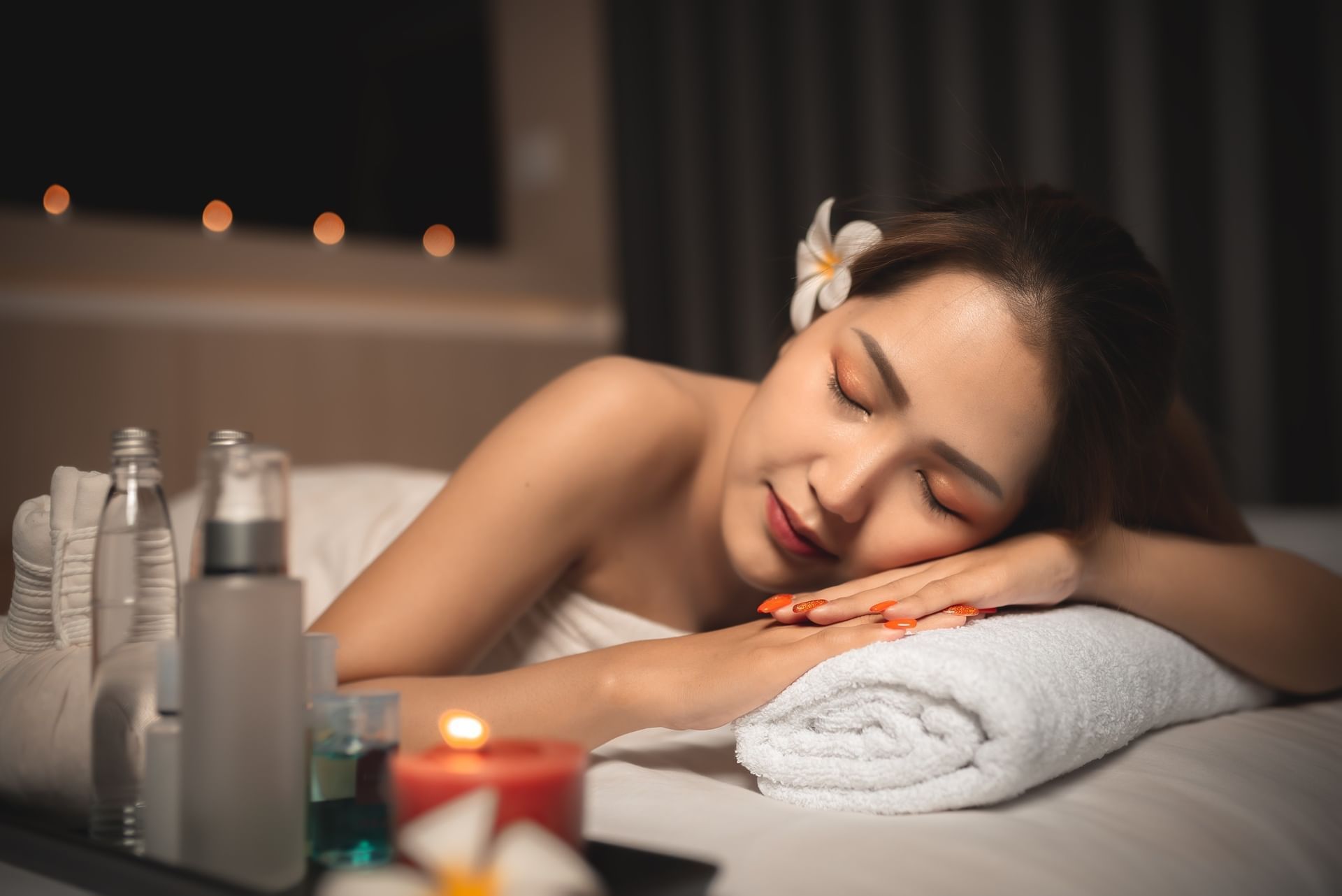 Close-up of a woman lying down on a massage table for a relaxing treatment in the spa at El Conquistador Resort