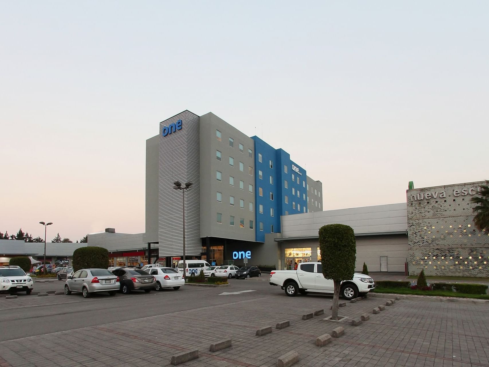 Exterior view of the hotel & parking area at One Hotels
