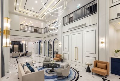 Hotel lobby lounge area with luxury chandelier at Eastin Vientiane Laos