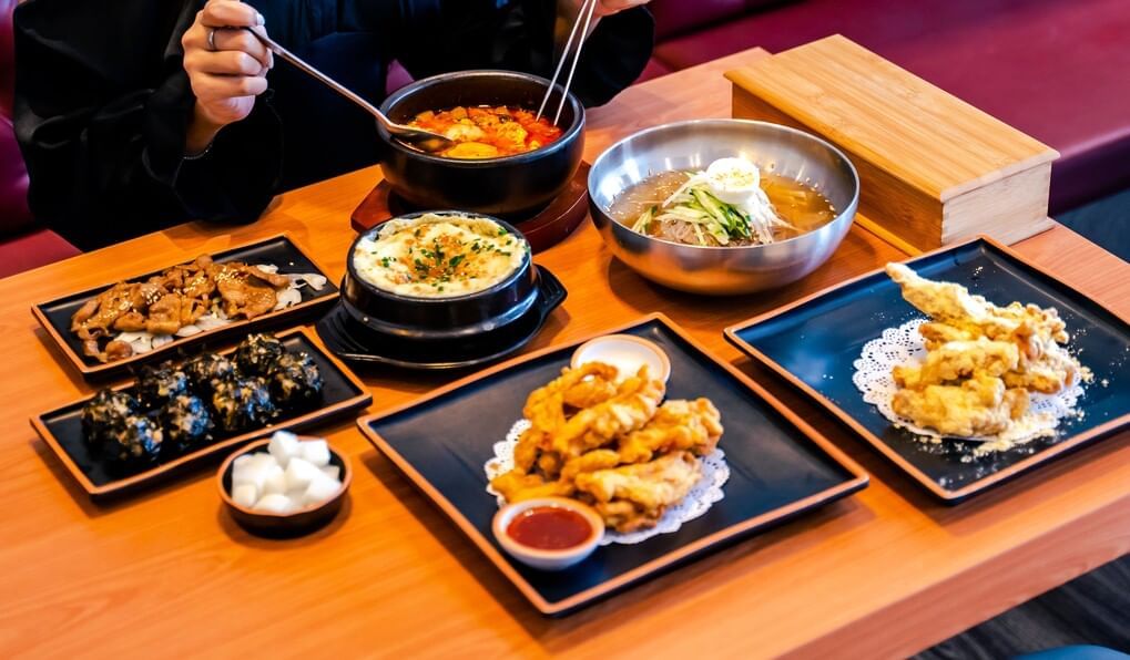A delightful table set with various plates of food served at Sunway Hotel Big Box