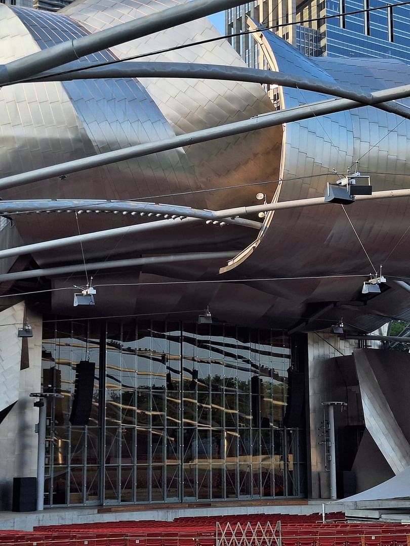 Metallic structure of the Jay Pritzker Pavilion in Millennium Park near Warwick Allerton Chicago
