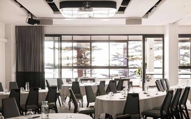 Pacific Ballroom at Elysium Manly showcasing Manly conference venues with round tables and formal chairs