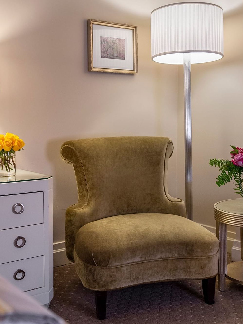 Couch with wood cabinet near floor lamp in Accessible Premier City View Two Double Beds at Warwick New York