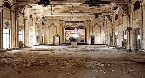 Facade is crumbling away of an old ballroom at The Mayo Hotel