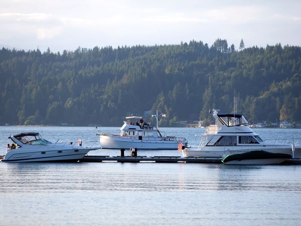 Multiple boats docked on canal at Alderbrook Resort & Spa