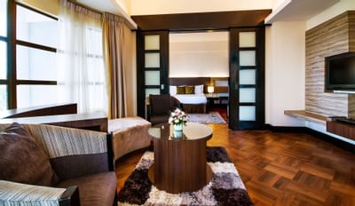 The living area in a room with a couch and a coffee table 