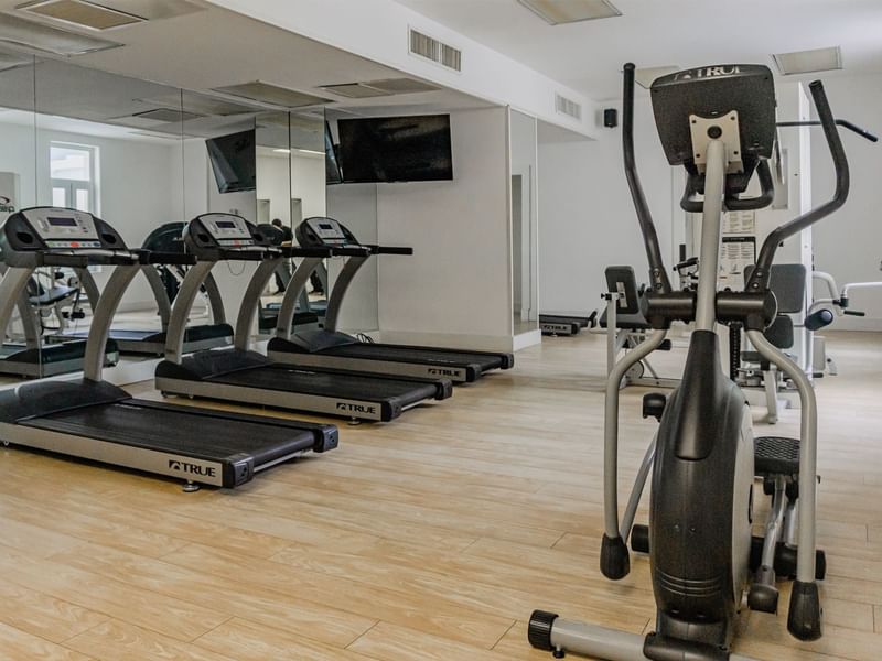 Exercise equipment in the fitness center at Gamma Hotels