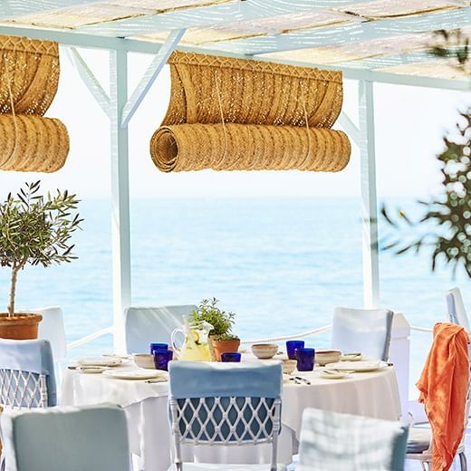Dining area with sea view at MC beach in Marbella Club Hotel