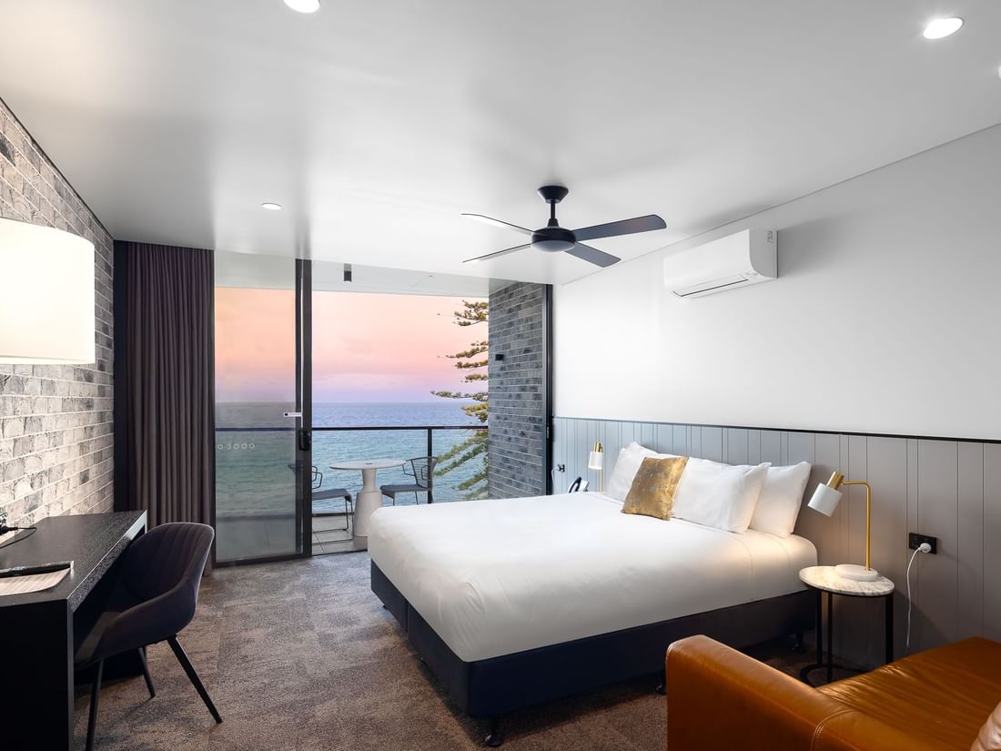 oceanfront room with sunset and the bay