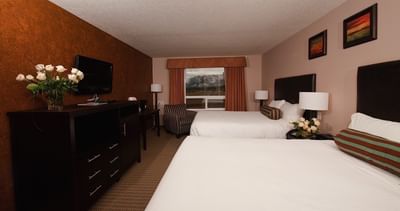 Two queen beds and dresser