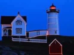 Brightly lit Nubble Lighthouse near Union Bluff Hotel