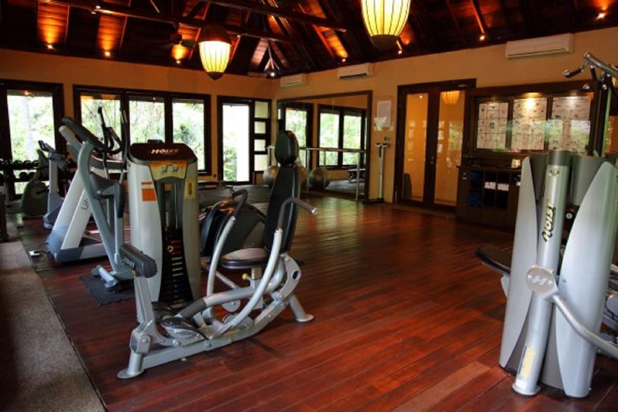 Interior of the Fitness Center with wooden floors at The Banjaran Hotsprings Retreat