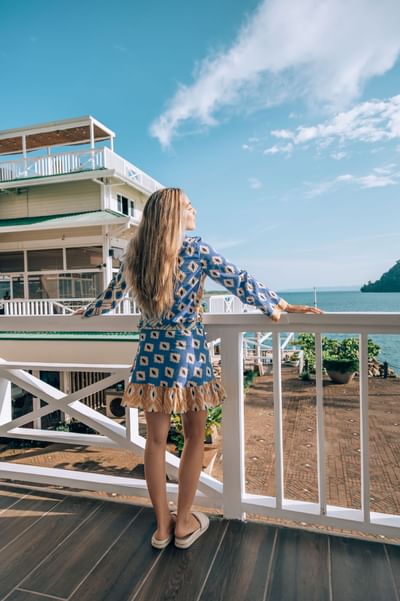 Lady overlooking the sea from the Amaka Ocean Living Lodge