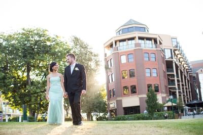Wedded couple strolling in the hotel at Amora Hotel Melbourne