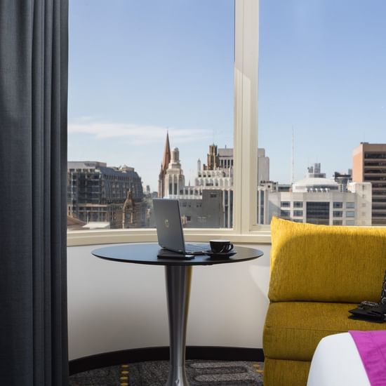 Premium Executive Room with couch at Pullman Melbourne CBD