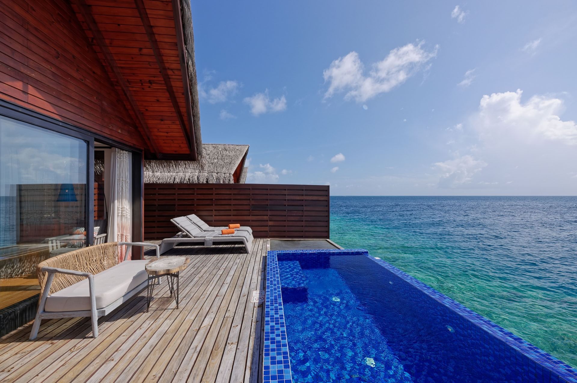 Reef Pool Water Villa with oceanfront deck at Grand Park Kodhipparu, Maldives