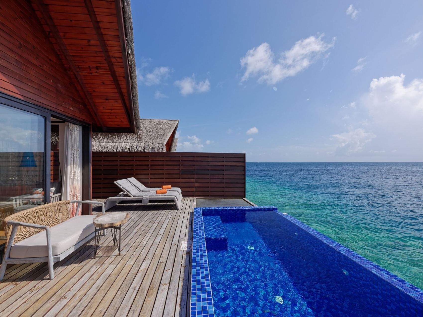 Reef Pool Water Villa with oceanfront deck at Grand Park Kodhipparu, Maldives