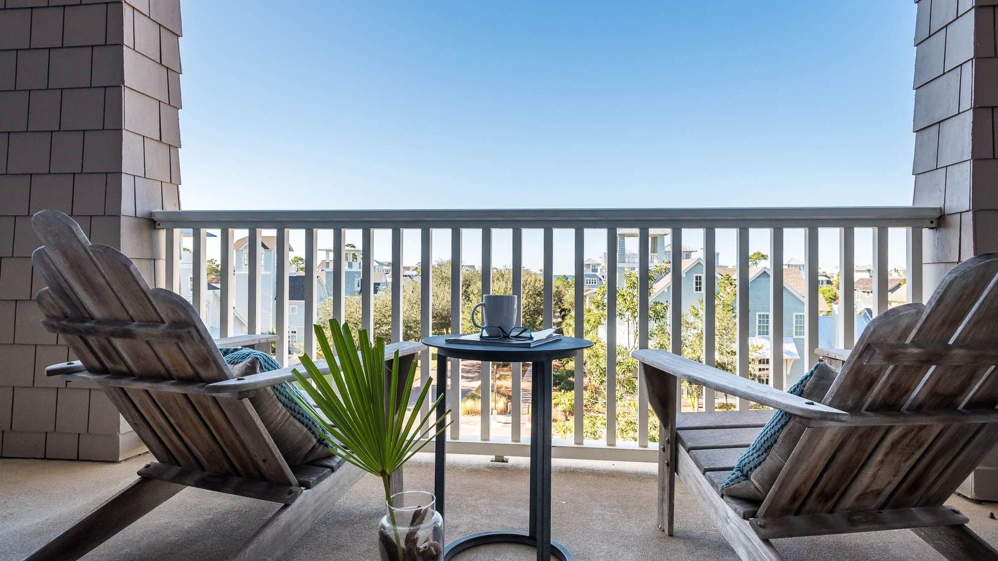 Balcony lounge area overlooking the complex in Premium Resort Suite at Watersound Inn