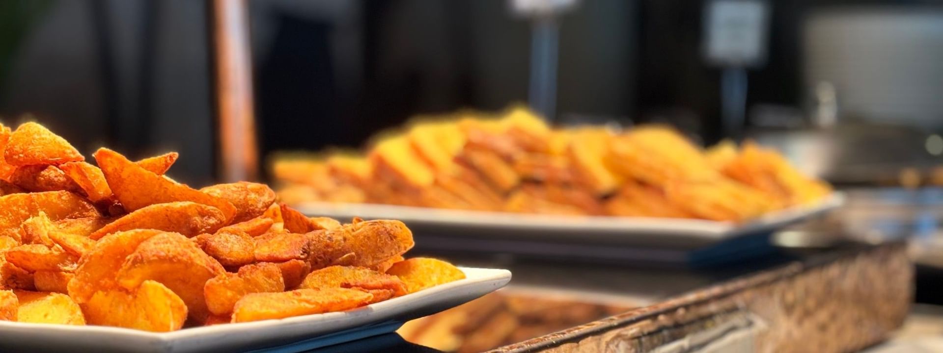 Plates of fried potato wedges at Bula Brasserie in Korolevu at Warwick Fiji Resort and Spa