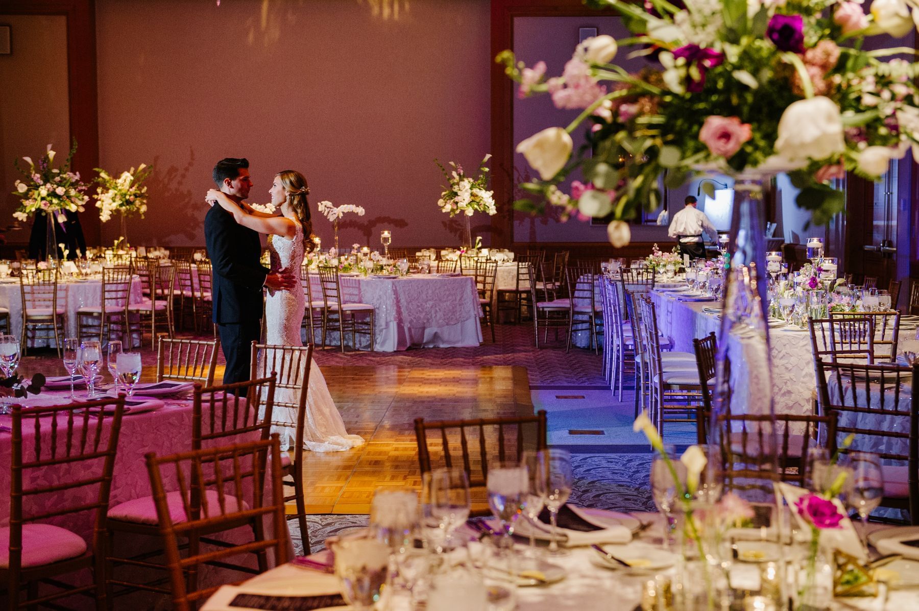 Wedding table with glassware & floral decorations in the Ballroom at Umstead Hotel and Spa