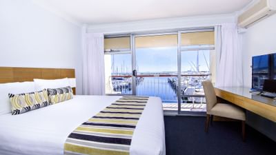 Bedroom with one bed in an apartment at Be Fremantle