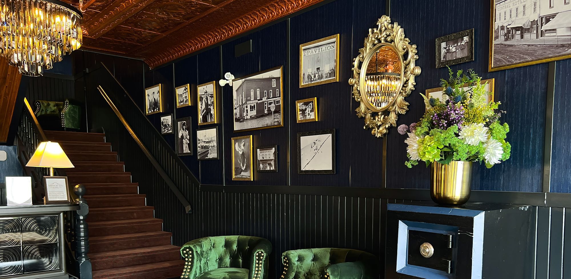 Stairway by the lobby lounge area with vintage interior at Midnight Sun, a Coast Hotel