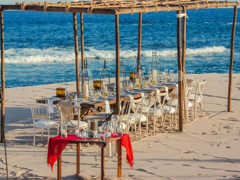 Tables in a beach wedding at Grand Fiesta Americana Los Cabos
