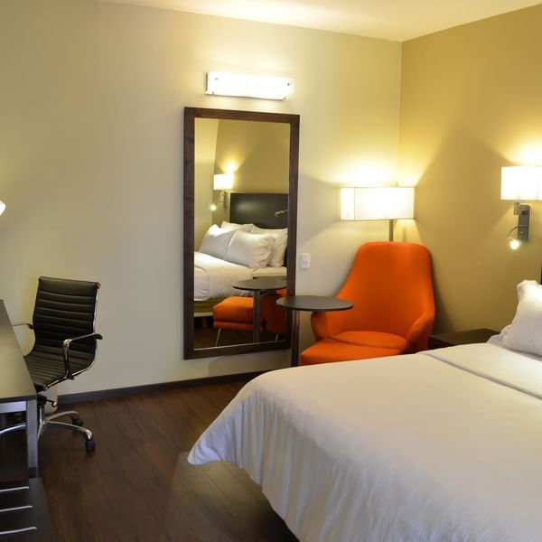 Junior Suite with working table & large mirror at Fiesta Inn