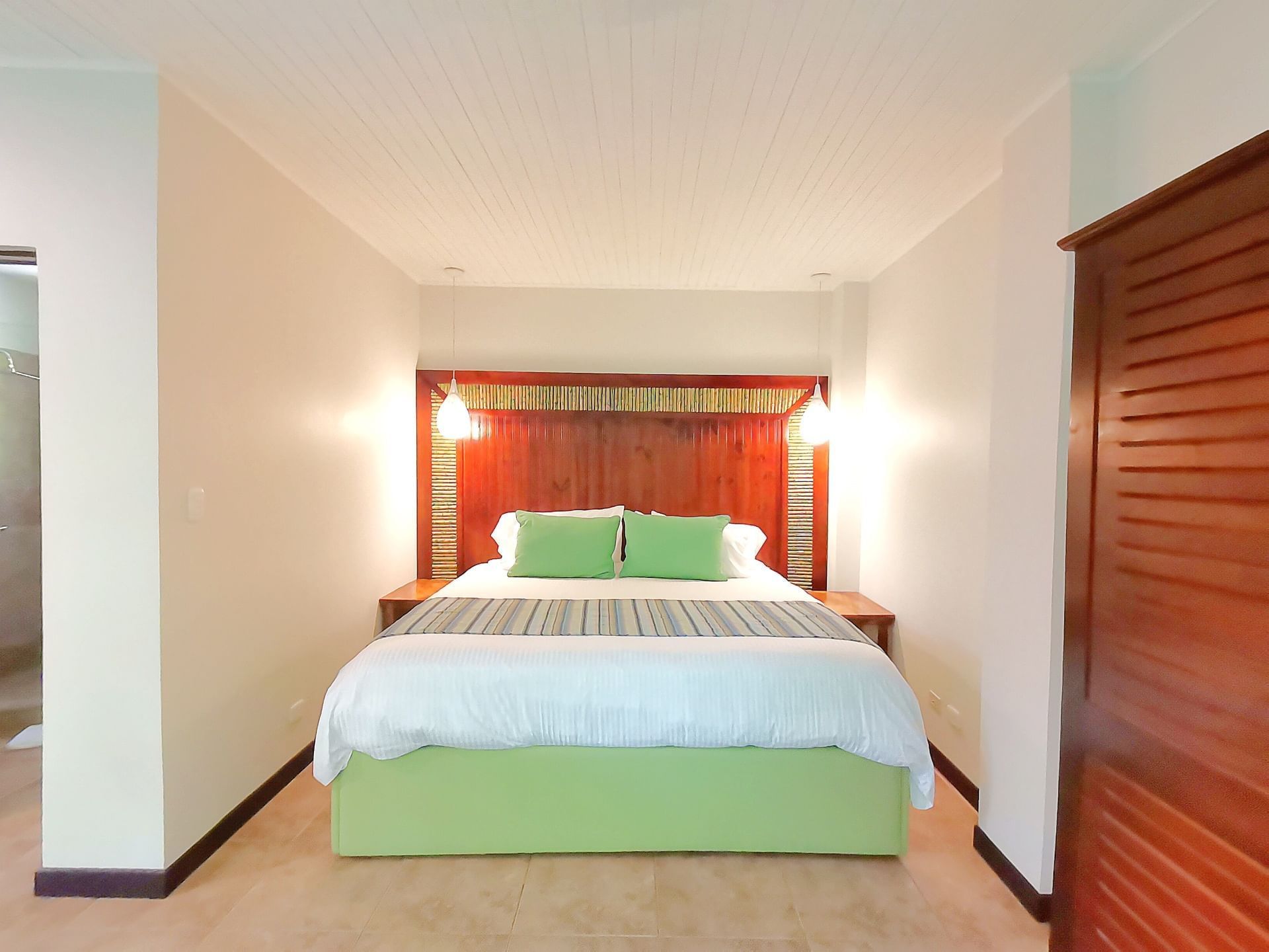 Comfy king bed in Tucan Suites at Jungle Vista Boutique Hotel