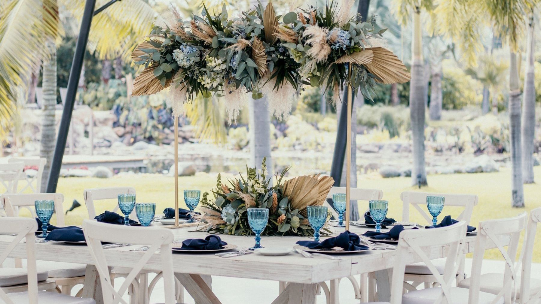 Glasses on the decorated outdoor table at Naay Tulum Curamoria