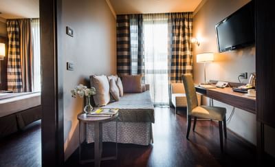 Interior of the living room in Junior Suite at Uptown Palace