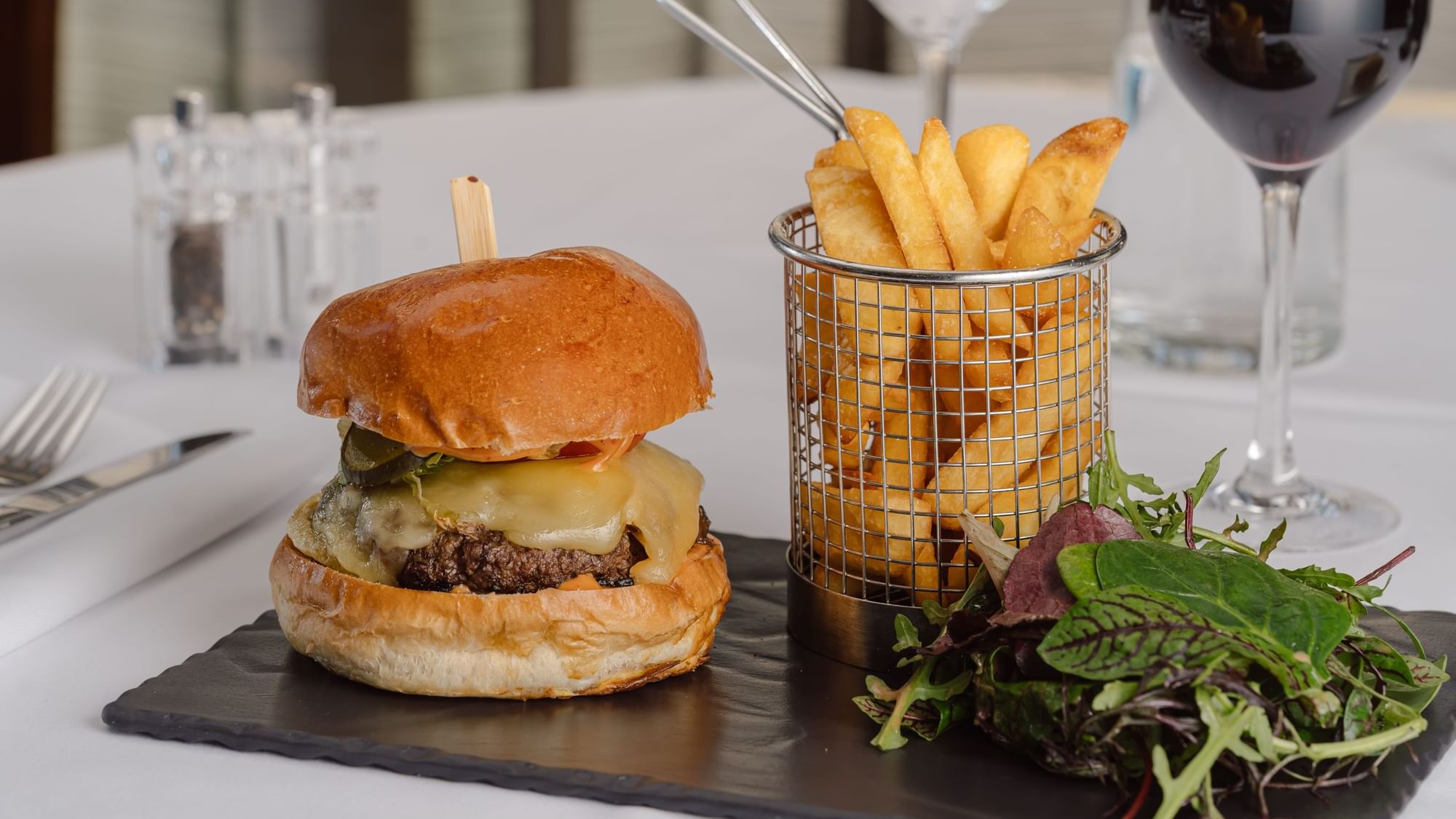 Close-up of Cheeseburger served in Teseo Restaurant at Warwick Geneva