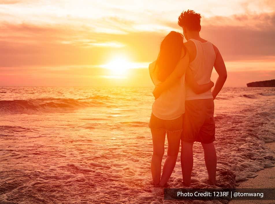  A couple holding each other while watching sunrise - Lexis Hibiscus