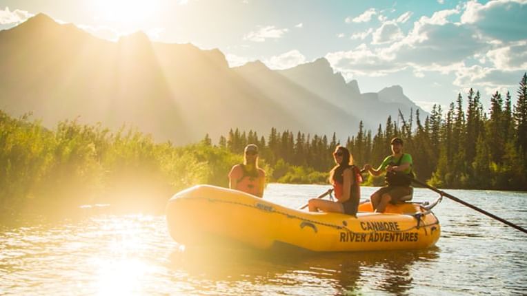Canmore River Adventures with mountains in background