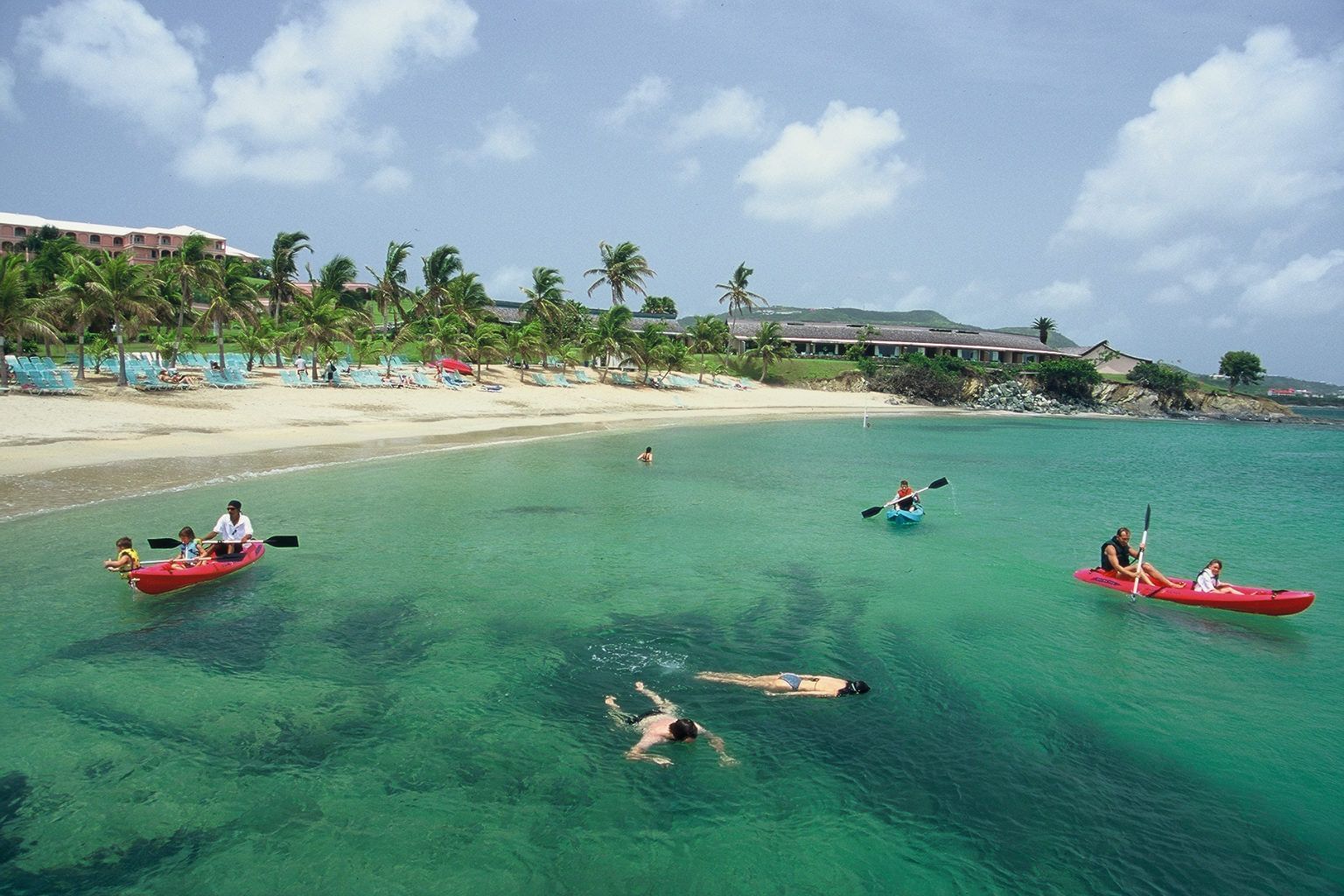 Kayakers & snorkelers at Mermaid Beach near The Buccaneer Resort St. Croix