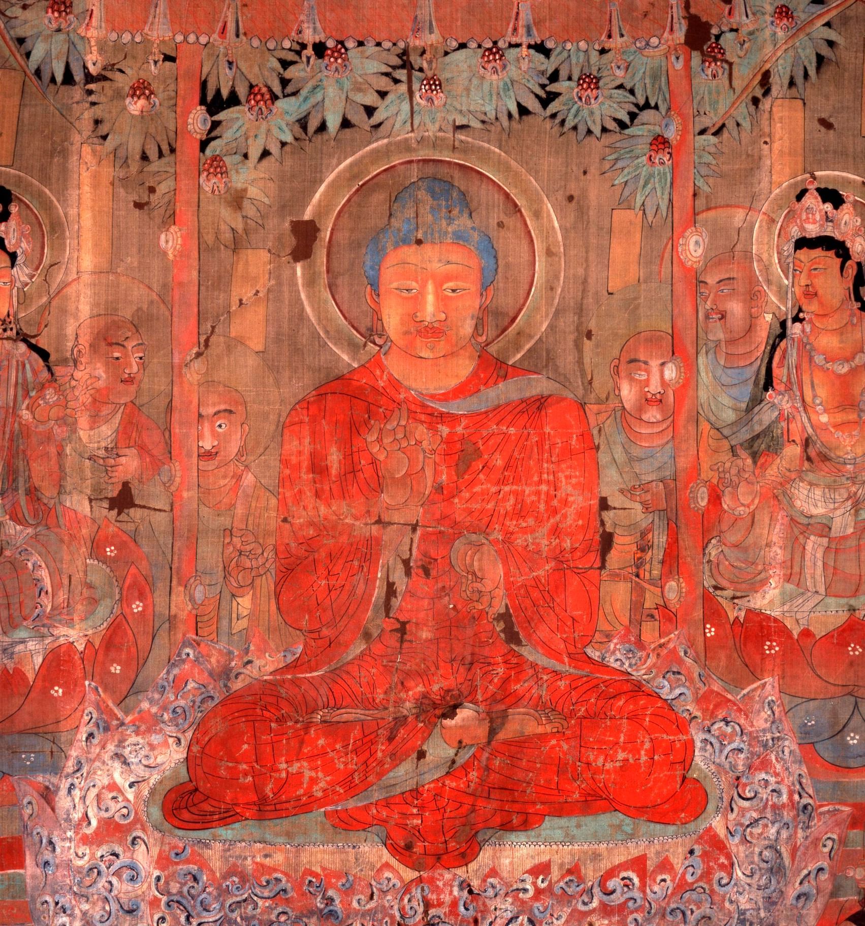 An ancient colourful Buddhist fresco depicting the Buddha meditating surrounded by disciples near The Londoner Hotel