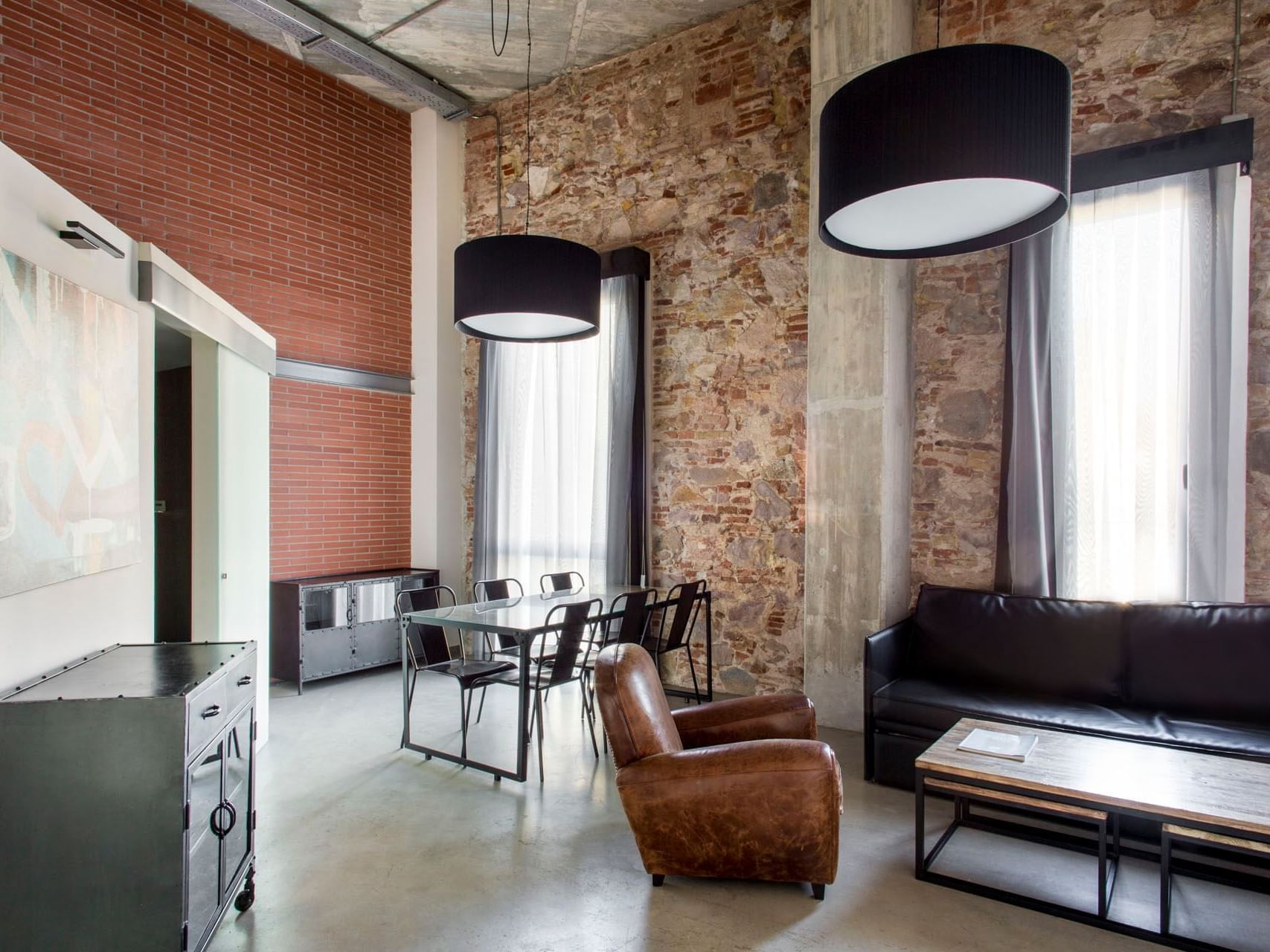 Dining & living area in Family Deluxe at Barcelona Apartment