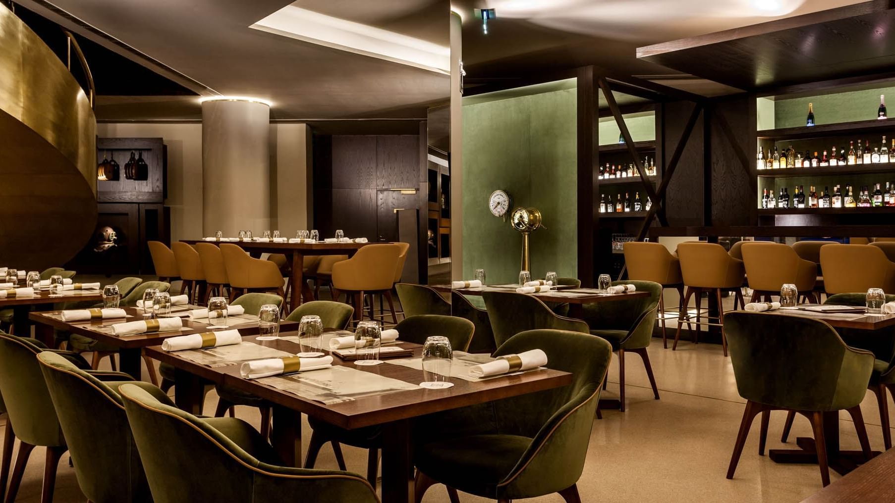 Dining tables arranged in Vapore Restaurant at Grand Hotel Açores Atlântico