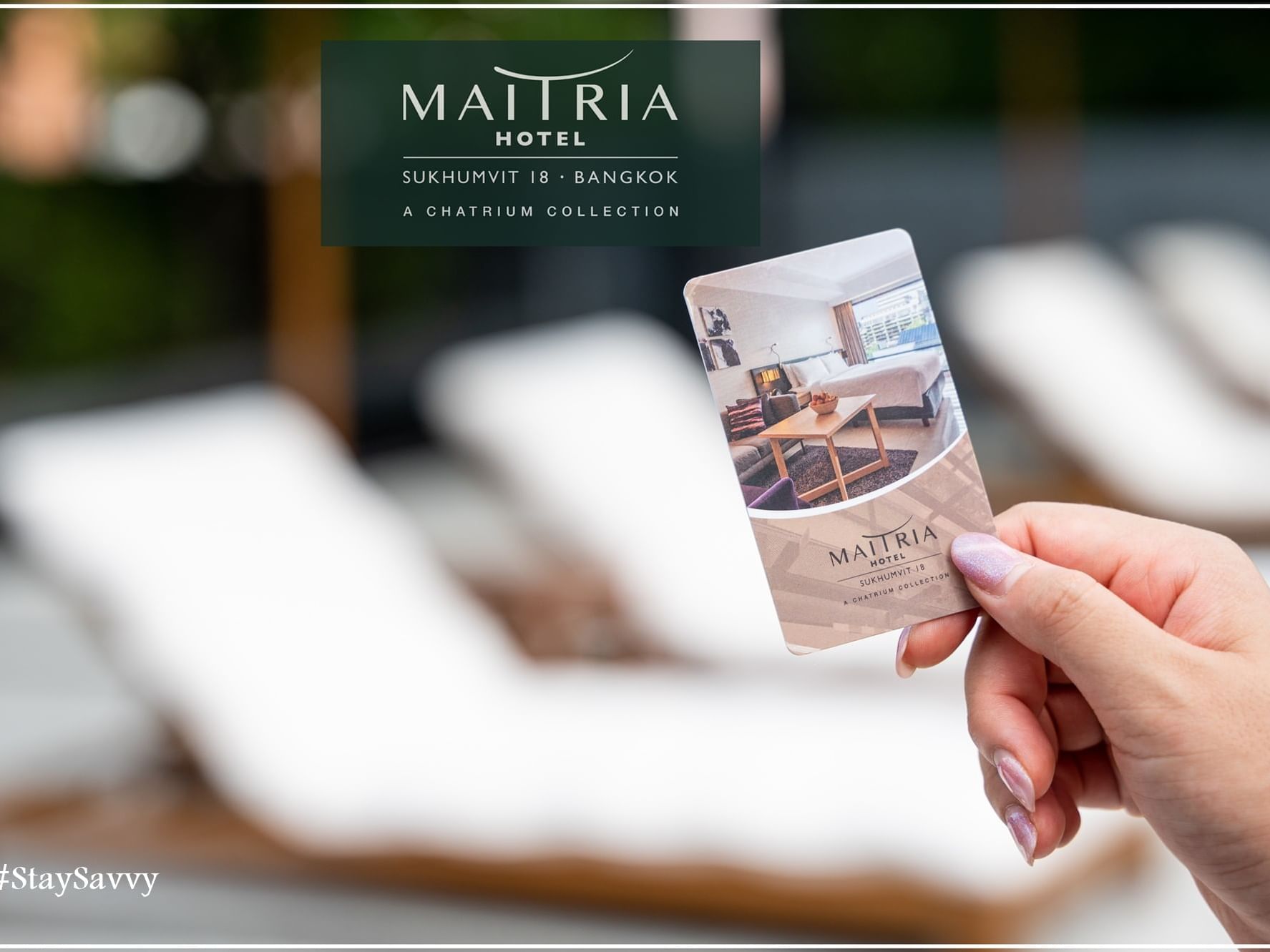 Close-up of a Visiting card of Maitria Hotel Sukhumvit 18